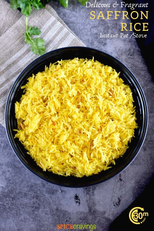 light golden and fragrant saffron rice in black bowl