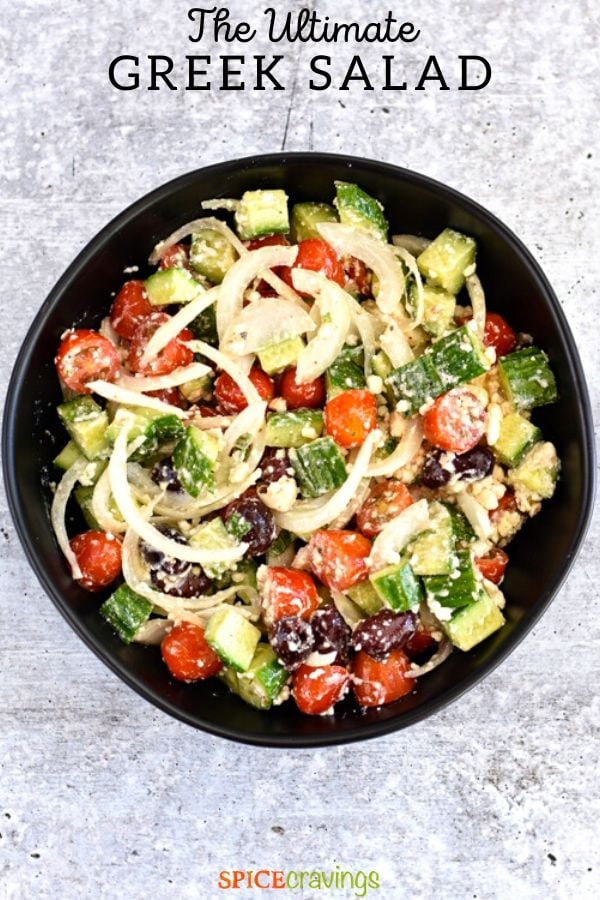 chopped cucumbers, tomatoes, onions, olives, feta in black bowl pinterest graphic