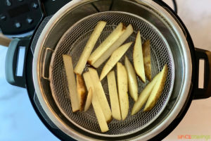 Air frying fries using an air fryer lid