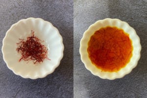 Bowl of dry saffron on the left and soaked saffron on the right
