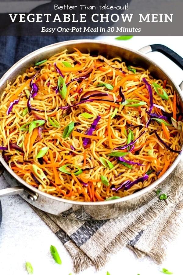sitr fried chinese noodles with vegetables in stainless steel chef pan