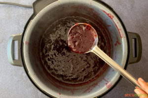 Ladle of freshly cooked jam