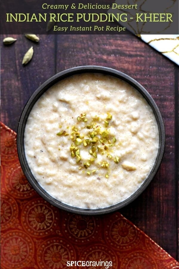 A bowl of creamy rice pudding, called Kheer, garnished with chopped pistachios
