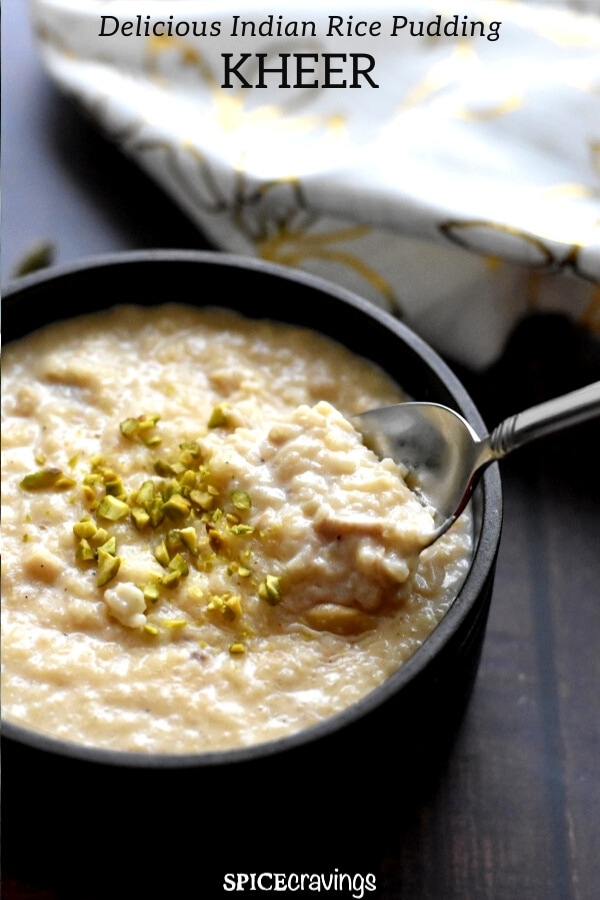 A bowl of Indian rice pudding with chopped pistachios on top