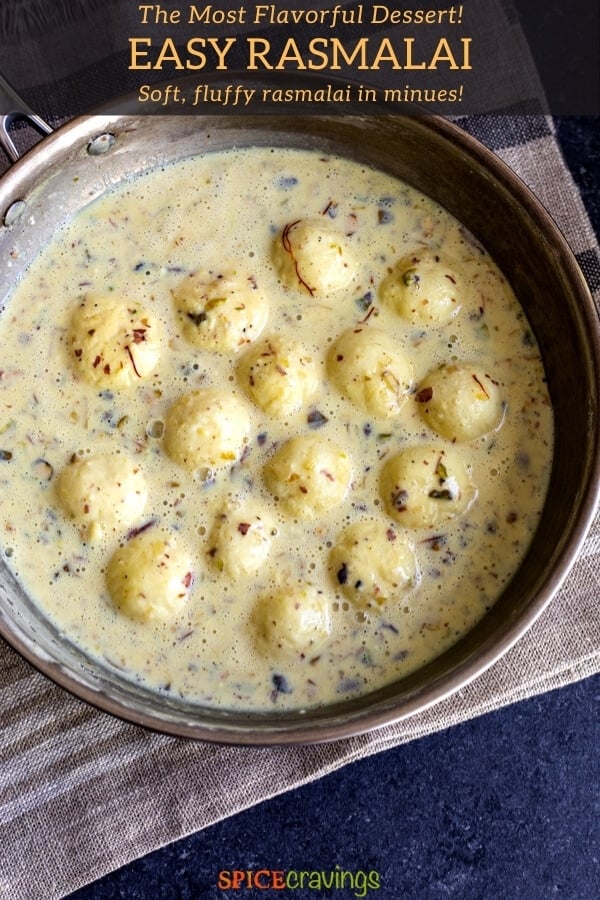 rasgulla balls in sweet cream with nuts, saffron and cardamom in bowl