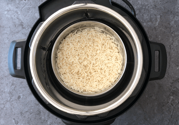 cooking rice in a small pot inside the instant pot