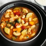 minestrone soup in black bowl