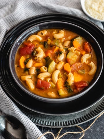 minestrone soup in black bowl