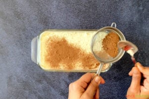 dusting a layer of cocoa powder