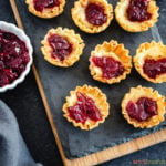 Phyllo shells filled with cranberry sauce and brie