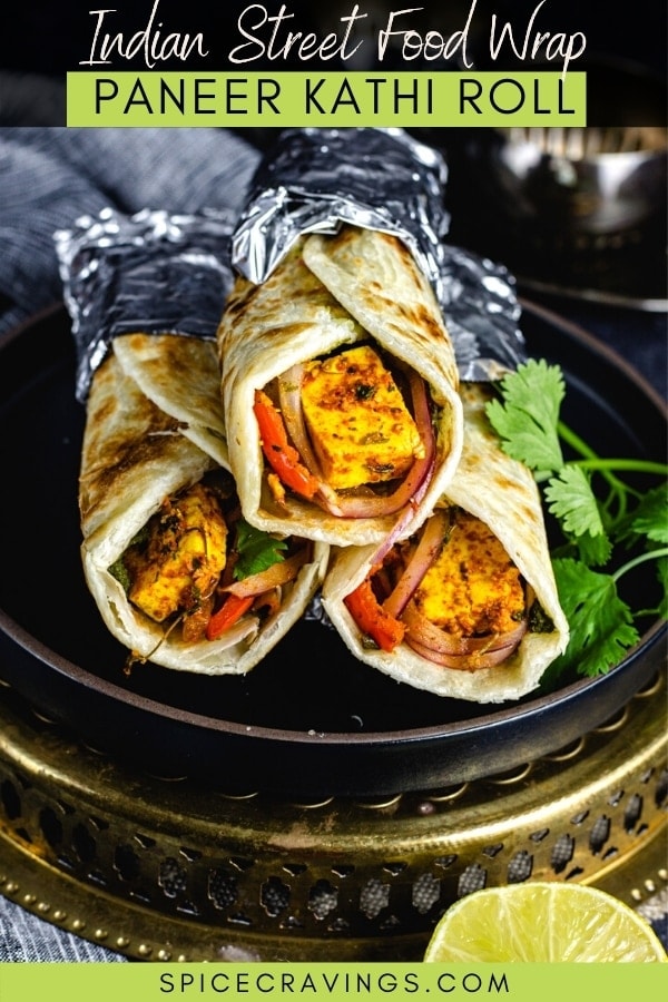 A stack of kathi rolls filled with paneer on a plate