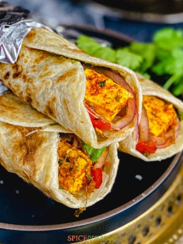 A stack of paneer kathi rolls
