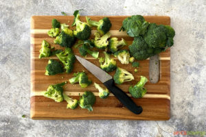 Cut broccoli on a cutting board