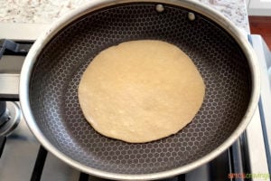 Cooking Indian flatbread in a non stick pan