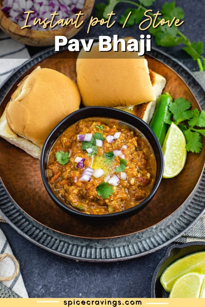 Indian pav bhaji served with lime wedge and cilantro