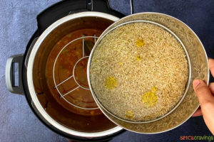 Adding rice to Kala Chana