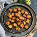Air Fryer Tofu on a black plate