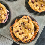 healthy almond flour banana chocolate chip muffins in muffin tin