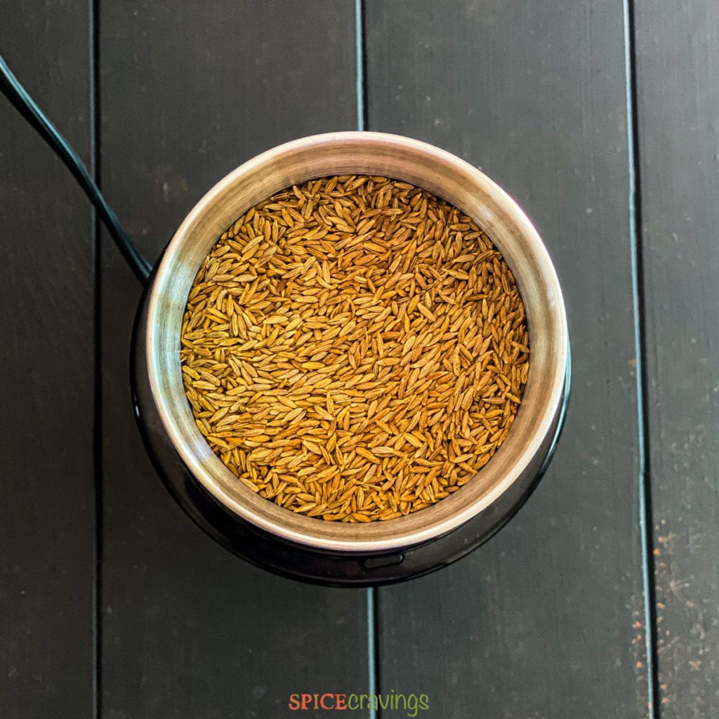 cumin seeds in spice grinder