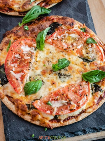 Pizza with tomato and basil