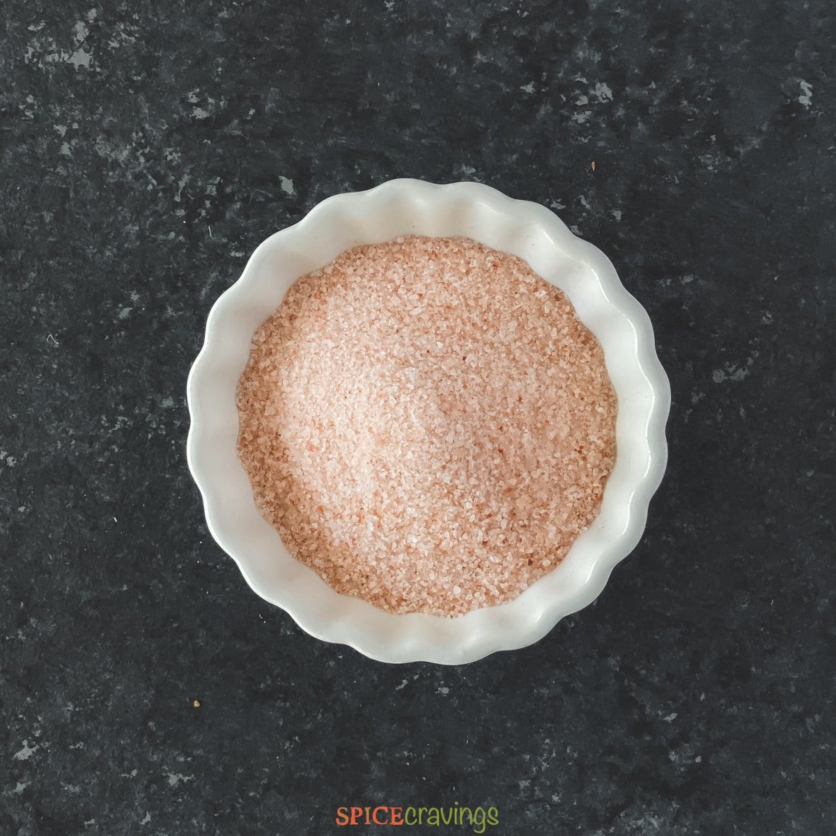 pink himalayan salt in white bowl