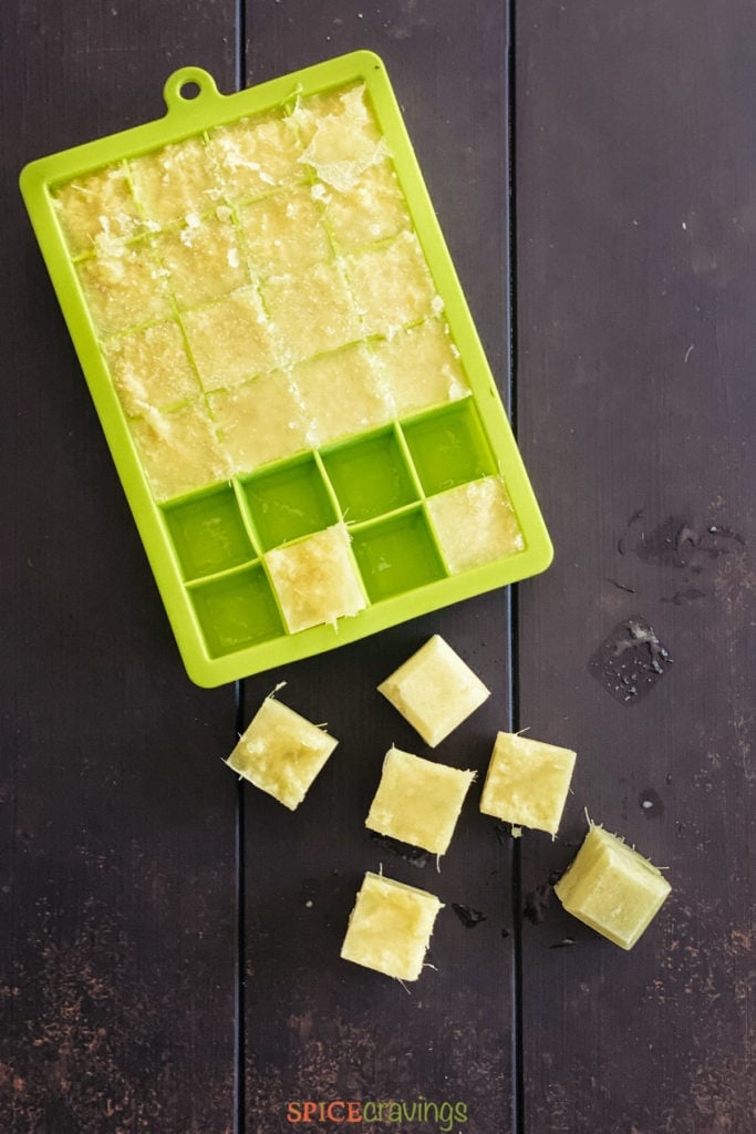 ginger paste cubes in green ice cube tray