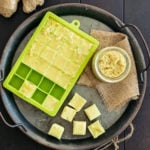 ginger paste and cubes in green ice cube tray