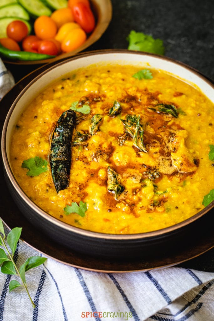 Dal tadka, indian lentil curry garnished with red chili