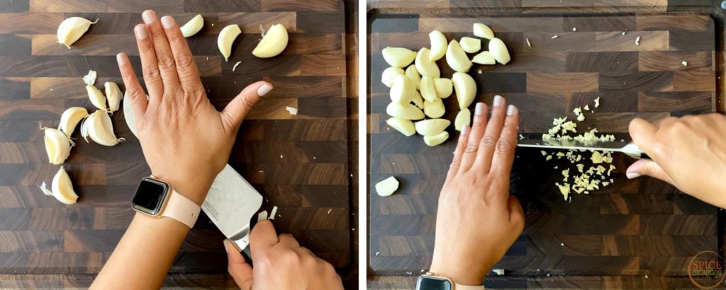 two hands peeling and chopping garlic