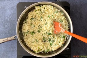 sautéing cauliflower rice with cilantro