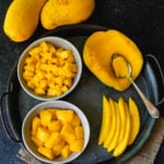 mango sliced, cubed, diced and scooped with a spoon