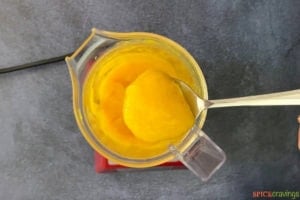 Mango puree in blender jar