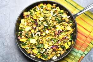 Chickpea kale salad with mango in skillet