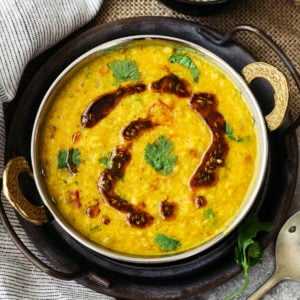 finished Moong dal in bowl garnished with ghee tempering called tadka