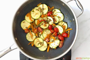 zucchini, tomatoes, bell pepper, and green onion sautéed in skillet