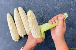 corn being shucked