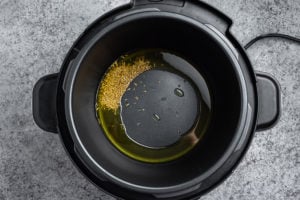 Sizzling cumin seeds in oil in instant pot