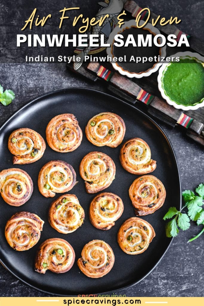 Puff pastry pinwheels on black plate with green chutney