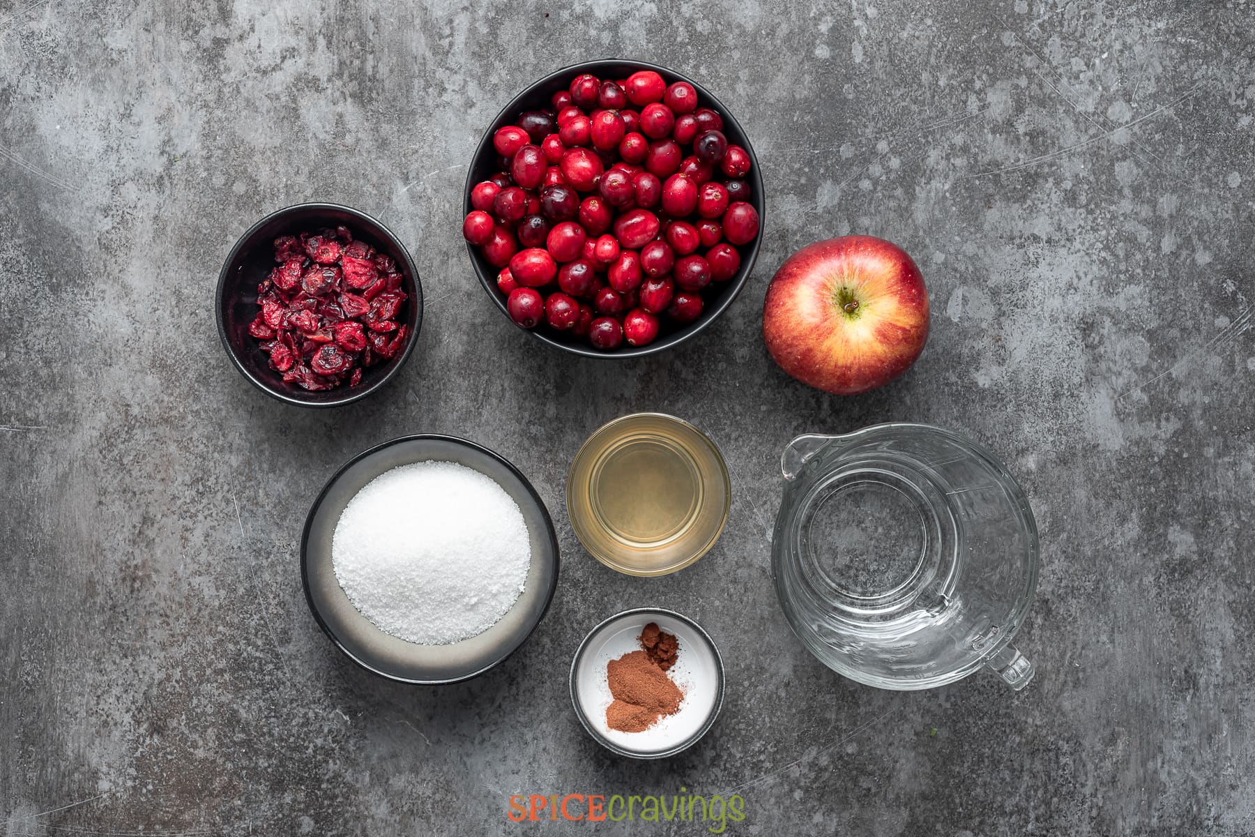 cranberry chutney ingredients on a grey board