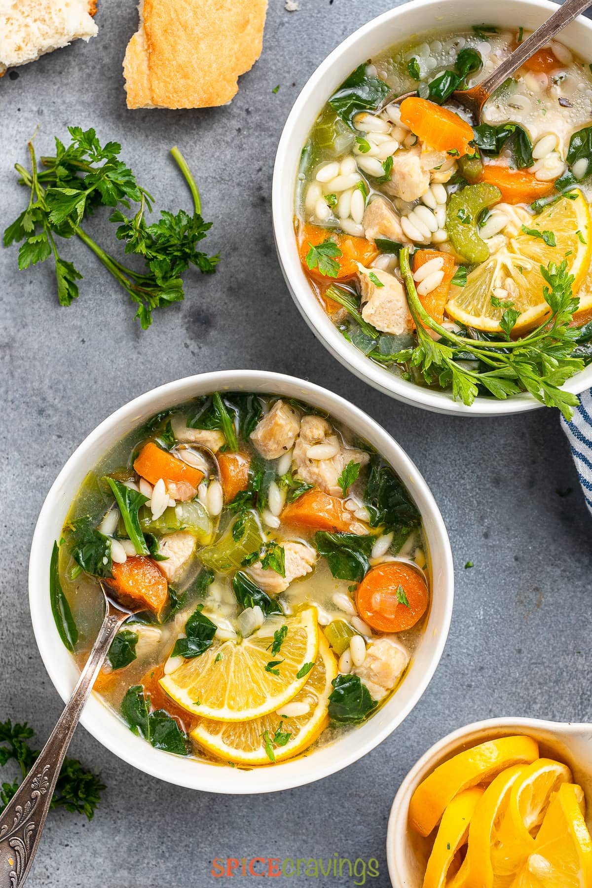 two bowls of lemon orzo soup from above