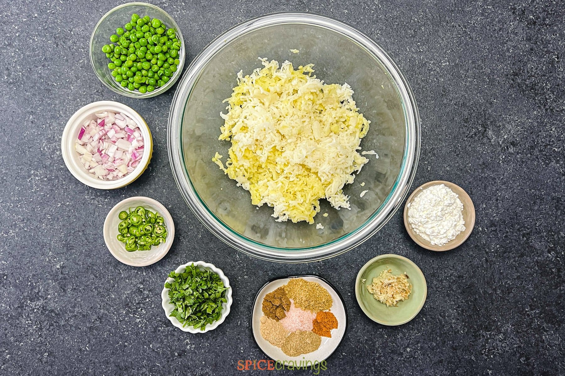 ingredients for aloo tikki potato patties in bowls from above
