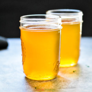 Two mason jars with ghee