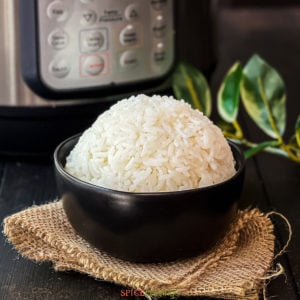 jasmine rice piled high in black bowl