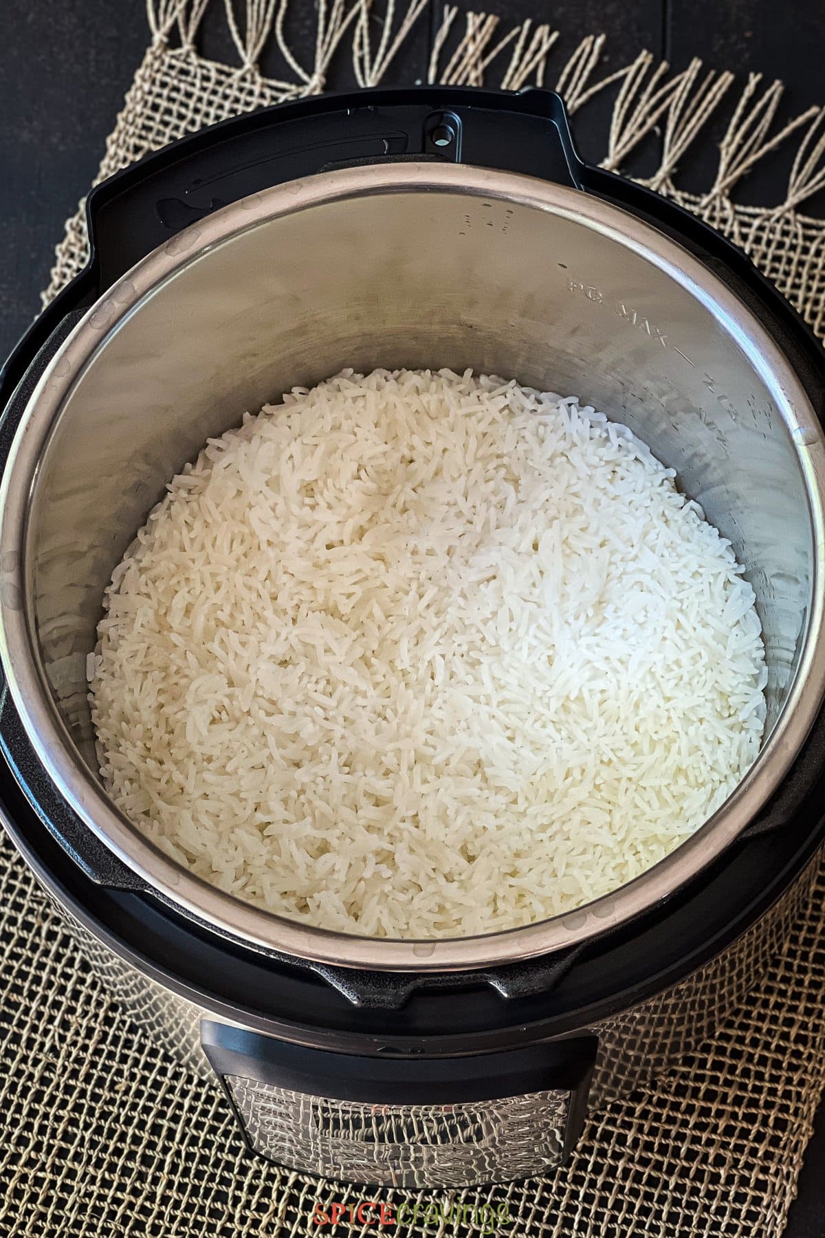 cooked jasmine rice in stainless steel inner pot