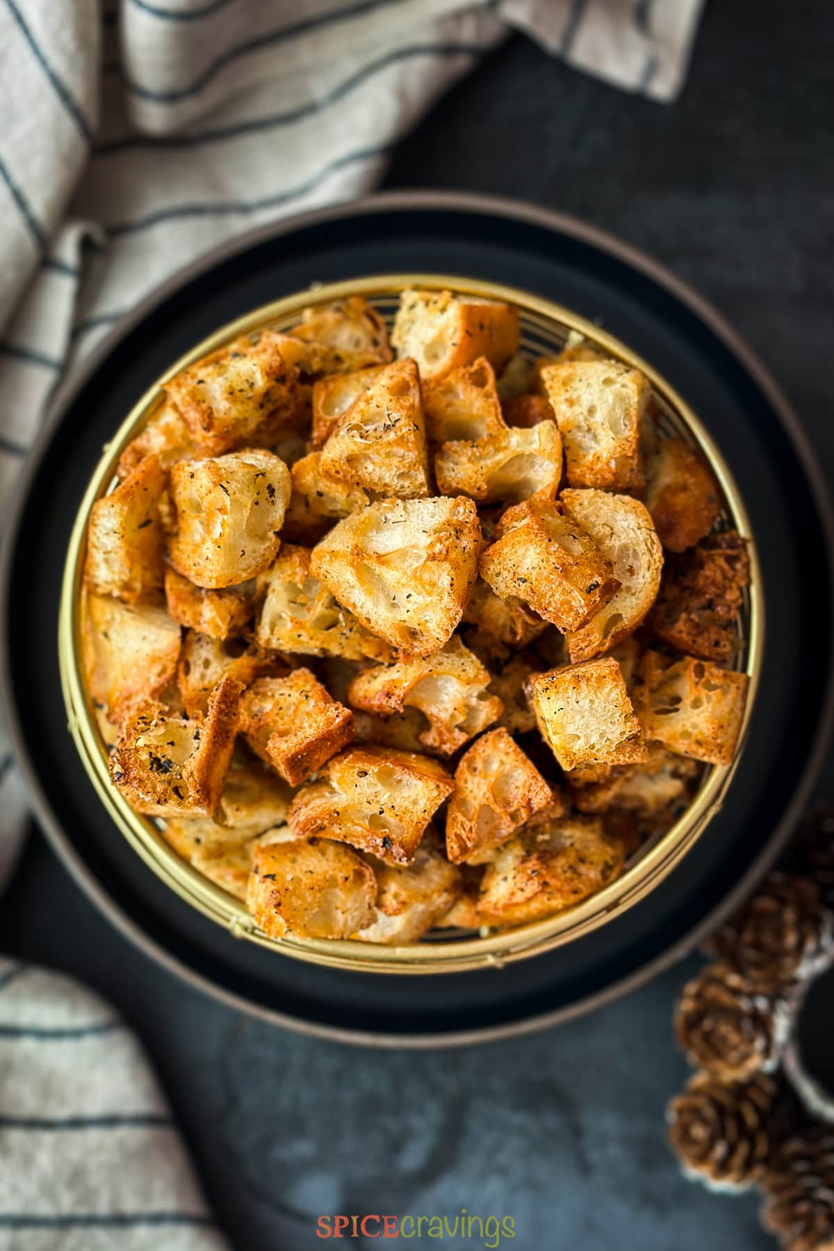 Top view of a bowl full of crisp croutons