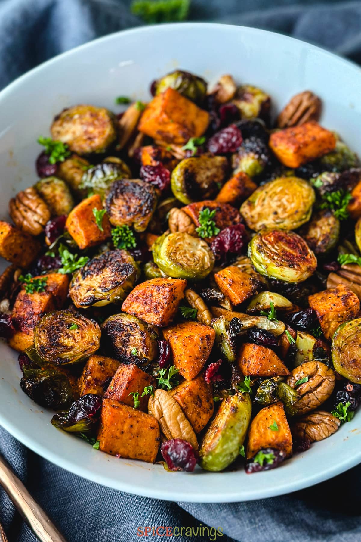 roasted sweet potato brussel sprouts in large serving bowl