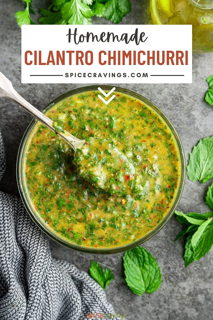 cilantro chimichurri sauce in glass bowl with spoon