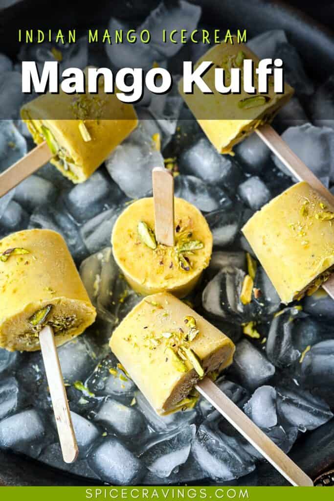 Indian mango ice cream with sticks garnished with sliced pistachios