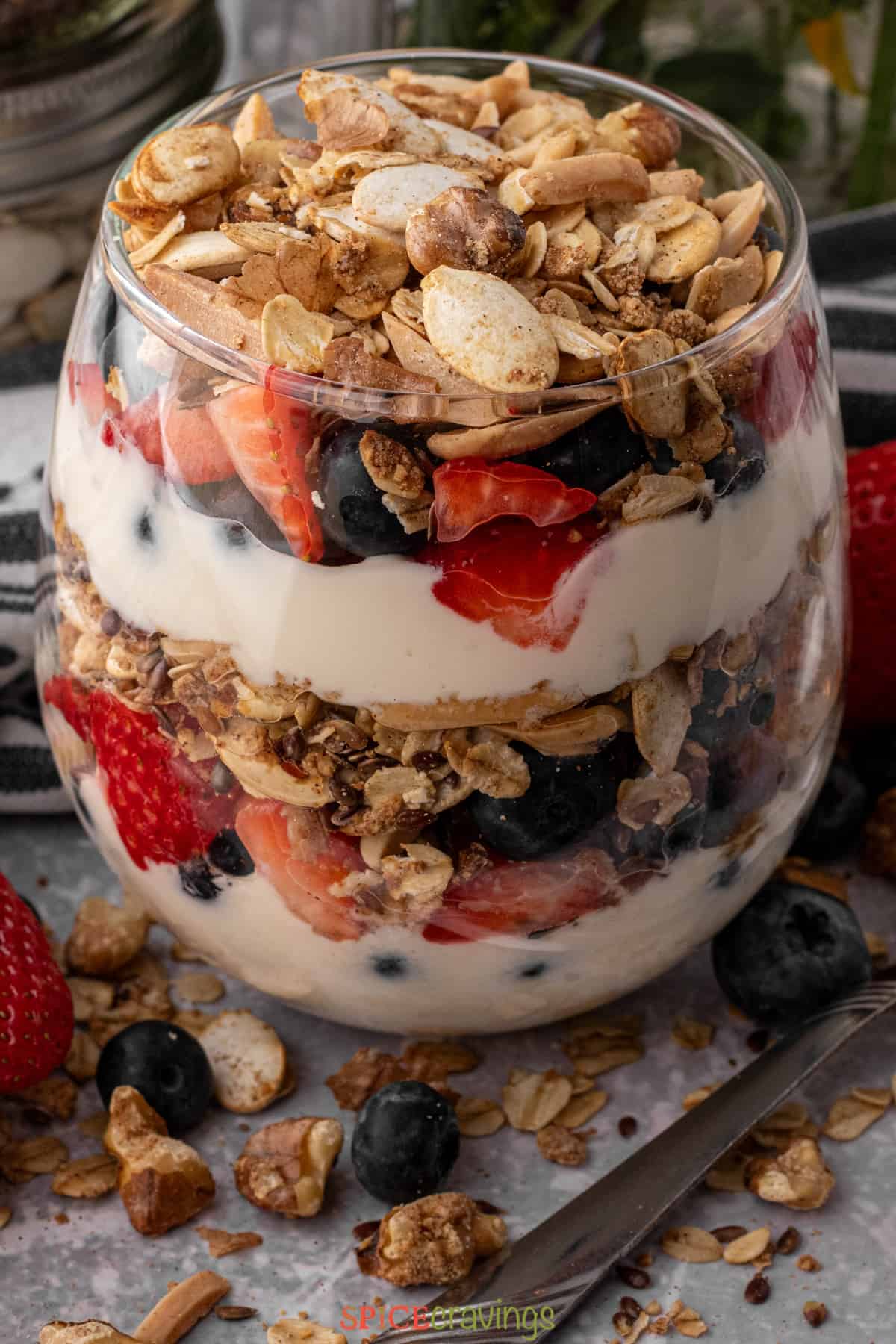 high protein yogurt and fruit parfait in glass jar