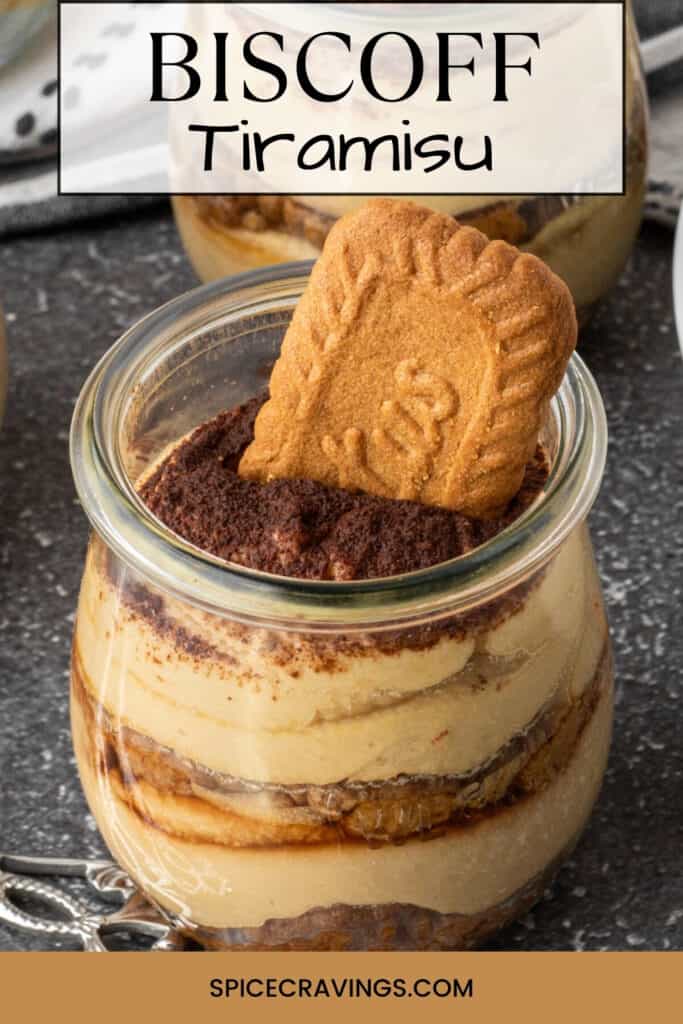 layered Biscoff tiramisu in small glass jar with speculoos cookie